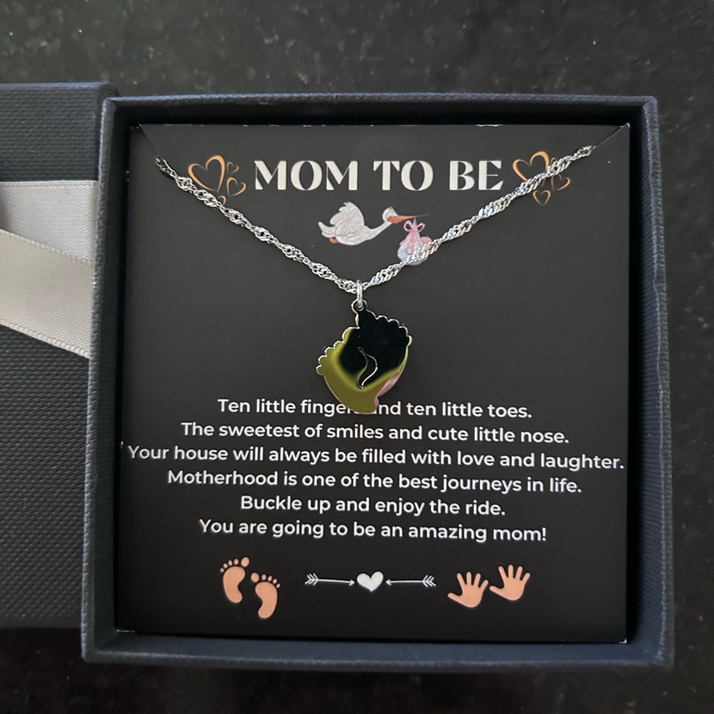 Brand new silver lotus brand “mom to be” necklace
